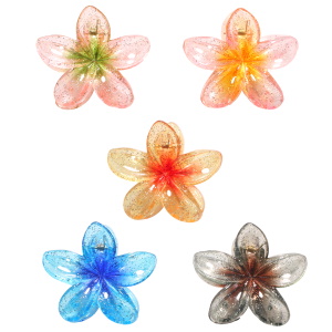 Pince crabe pour cheveux en forme de fleur en plastique de couleur. 5 coloris différents. Vendu à l'unité. Votre préférence en commentaire.