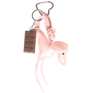 Porte clés en forme de chien avec une tablette de chocolat en acier argenté, polyuréthane, textile et plastique.