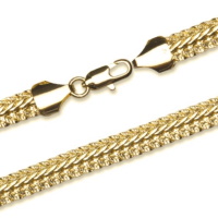 Bracelet chaîne en plaqué or jaune 18 carats.