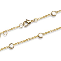 Bracelet composé d'une chaîne en plaqué or jaune 18 carats et de 5 oxydes de zirconium blancs sertis clos de forme ronde. Fermoir anneau ressort avec anneaux de rappel à 16, 17 et 18 cm.