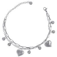 Bracelet composé d'une double chaîne et de pampilles cœurs et boules en acier argenté. Fermoir mousqueton avec 5 cm de rallonge.