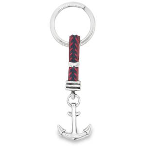 Ce porte-clés élégant présente un design nautique avec un motif d'ancre argentée suspendue à un anneau métallique robuste. La combinaison de matériaux et le thème marin en font un accessoire à la fois fonctionnel et esthétique pour tous les amoureux de la mer.