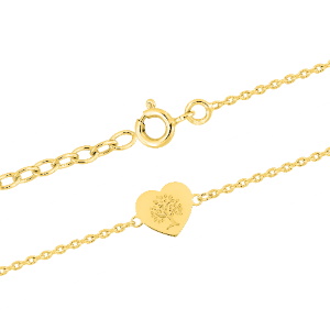 Magnifique bracelet chaîne avec un médaillon en forme de cœur gravé d'un arbre de vie en plaqué or jaune 18 carats. Fermoir anneau ressort avec 3 cm de rallonge.